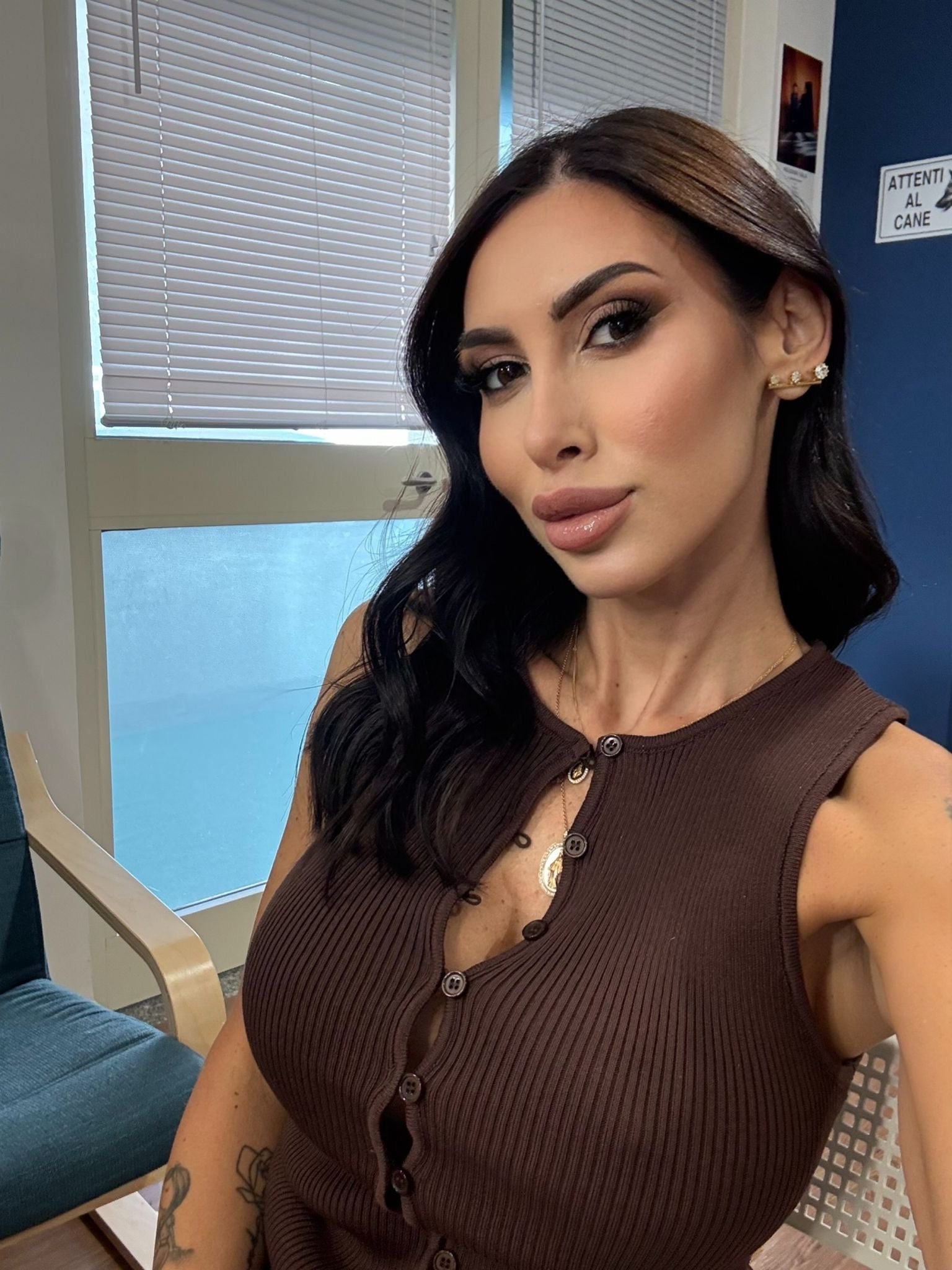 Maglia a costine bottoncini